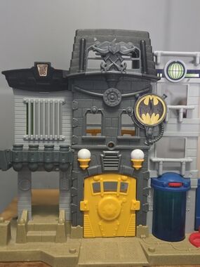 Gray and Yellow Kids Playset Building with Bat Emblem